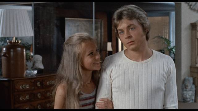 Michael (Hywel Bennett) can't avoid the distrust, even contempt, of Ellie (Hayley Mills)'s relatives in Sidney Gilliat's Endless Night (1972)