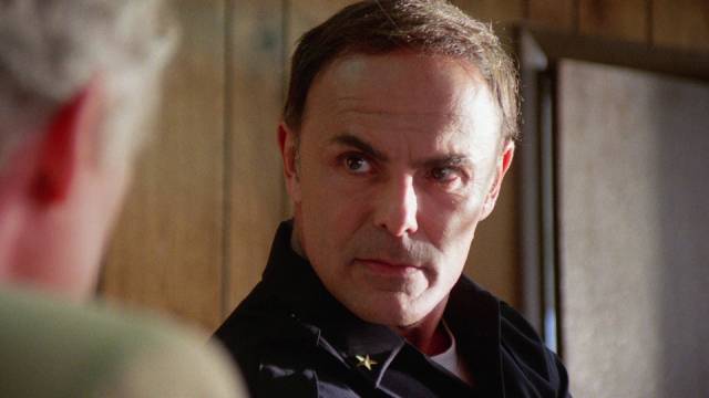 John Saxon as bad cop Strycher in Umberto Lenzi's Nightmare Beach (1989)