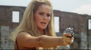 Hunter Caroline Meredith (Ursula Andress) stalks her prey in Elio Petri's The 19th Victim (1965)