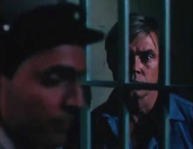 Dennis Cole as wrongfully convicted Derek Keillor in John Saxon's Death House (1988)
