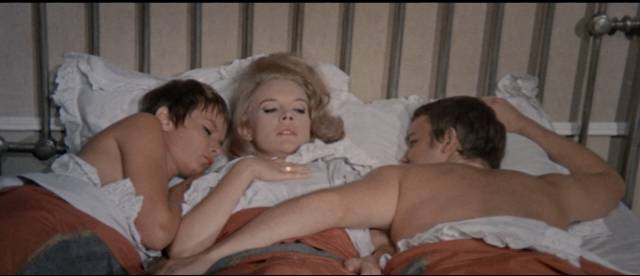 Carroll Baker is seduced by brother and sister Lou Castel and Colette Descombes in Umberto Lenzi's Orgasmo (1969)