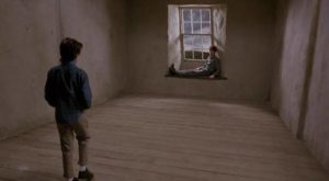 Anna (Charlotte Burke) discovers Marc (Elliott Spiers) imprisoned in the house she has imagined in Bernard Rose's Paperhouse (1988)