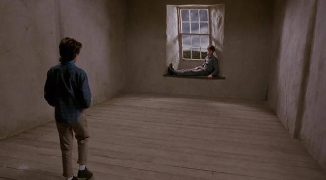 Anna (Charlotte Burke) discovers Marc (Elliott Spiers) imprisoned in the house she has imagined in Bernard Rose's Paperhouse (1988)