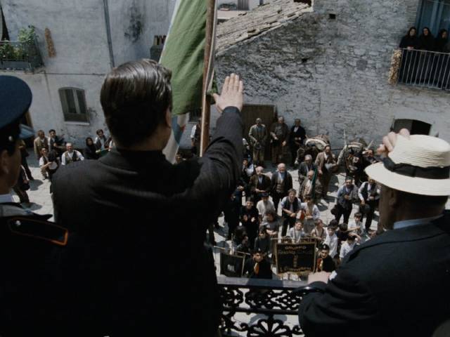 The mayor tries to stir enthusiasm among a disinterested population for Mussolini's war in Francesco Rosi's Christ Stopped at Eboli (1979)
