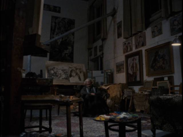 An older Carlo Levi (Gian Maria Volontè) sits among the paintings he made during his exile, remembering the people he lived among in Francesco Rosi's Christ Stopped at Eboli (1979)