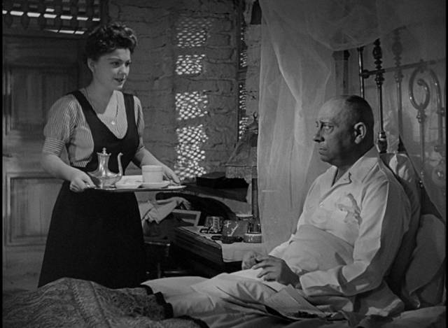 Mouche (Anne Baxter) attempts to seduce Field Marshall Erwin Rommel (Erich von Stroheim) in Billy Wilder's Five Graves to Cairo (1943)