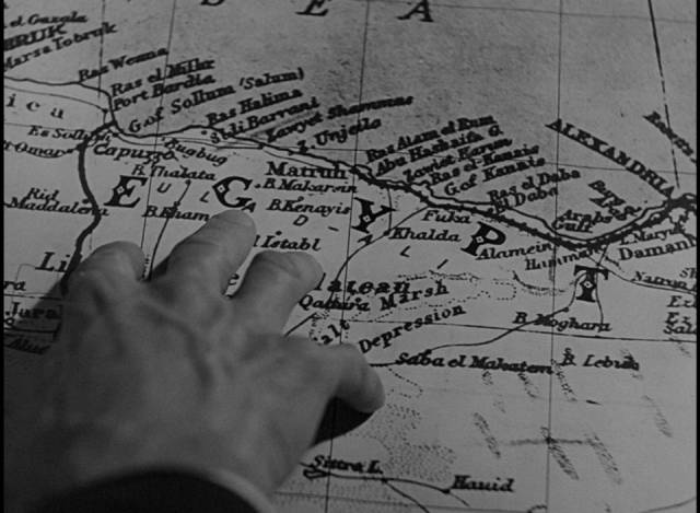 Cpl. John Bramble (Franchot Tone) discovers Field Marshall Erwin Rommel (Erich von Stroheim)'s secret hidden in plain sight in Billy Wilder's Five Graves to Cairo (1943)