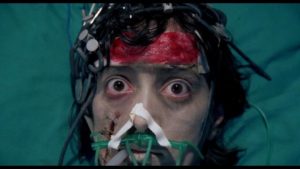 Kathy (Milijana Zirojevic) wreaks havoc from a coma in Lucio Fulci's Aenigma (1987)