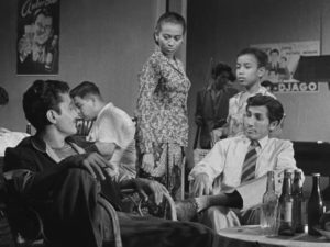 Iskandar (A.N. Alcaff) learns more from former squadmate Puja (Bambang Hermanto) in Usmar Ismail's After the Curfew (1954)