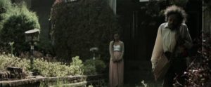 Candy (Daniel Tadesse) departs on his quest to seek information from the Witch (Shitaye Abraha) in Miguel Llanso's Crumbs (2015)