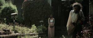 Candy (Daniel Tadesse) departs on his quest to seek information from the Witch (Shitaye Abraha) in Miguel Llanso's Crumbs (2015)