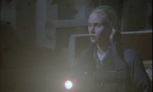 Lisa Harris (Meg Register) explores a Medieval convent in Lucio Fulci's Demonia (1990)