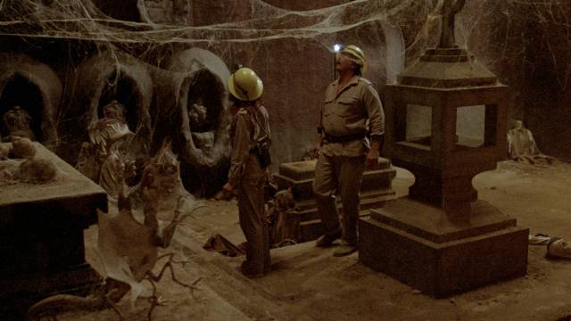 Jennifer (Samantha Eggar) and Mark Baines Roy Jenson) discover an ancient temple in Alfredo Zacarias' Demonoid (1981)