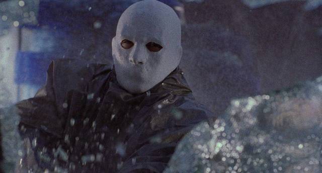 A masked killer stalks a small town in Jose Ramon Larraz's Edge of the Axe (1988)