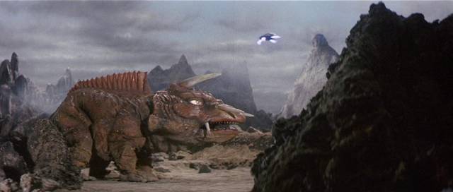 Gamera flies in to confront another monster in Noriaka Yuasa's Gamera vs Giger (1970)