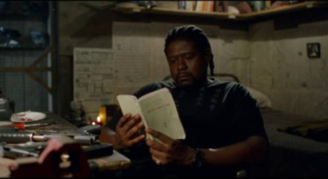 The hitman (Forest Whitaker) relaxes between contracts in Jim Jarmusch's Ghost Dog: The Way of the Samurai (1999)