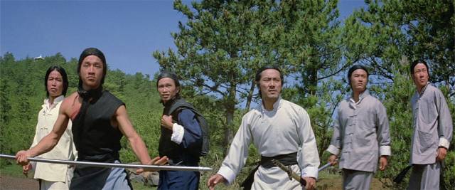 A young Jackie Chan (l) plays it straight in John Woo's The Hand of Death (1976)