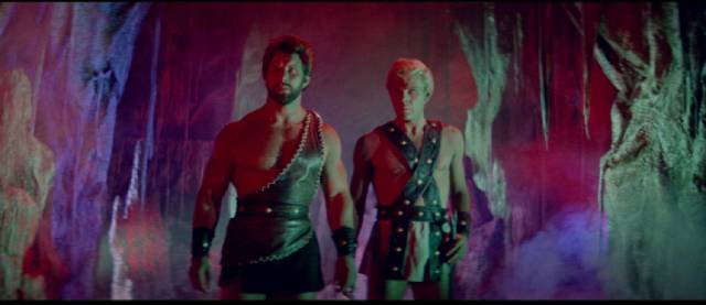 Hercules (Reg Park) and his friend Theseus (George Ardisson) enter the Underworld in Mario Bava's Hercules in the Haunted World (1961)
