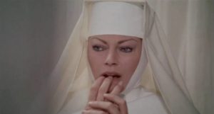 Sister Gertrude (Anita Ekberg) has doubts about her own sanity in Giullio Berruti's Killer Nun (1979)