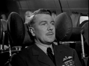 Air Marshal Hardie (Michael Redgrave) contemplates fate on a troubled flight in Leslie Norman's The Night My Number Came Up (1955)