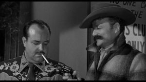 Brick (Brian Keith) pulls a gun on casino security man Eric Berg (William Conrad) in Phil Karlson's 5 Against the House (1955)