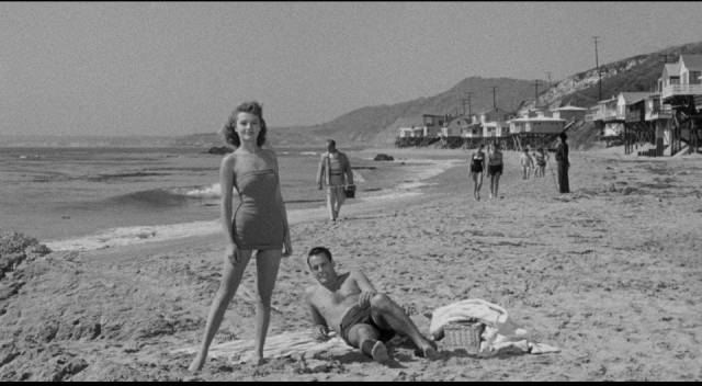 Eddie Shannon (Mickey Rooney) gets to meet Barbara Mathews (Dianne Foster)'s friend Steve Norris (Kevin McCarthy) in Richard Quine's Drive a Crooked Road (1954)