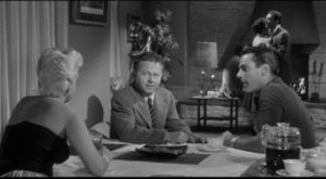 Steve Norris (Kevin McCarthy) offers Eddie Shannon (Mickey Rooney) some easy money in Richard Quine's Drive a Crooked Road (1954)