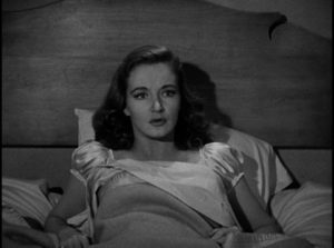 Eileen Carr (Nina Foch) wakes from a nightmare in Budd Boetticher's Escape in the Fog (945)