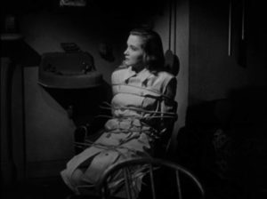 Eileen Carr (Nina Foch) finds herself in a really bad spot in Budd Boetticher's Escape in the Fog (1945)