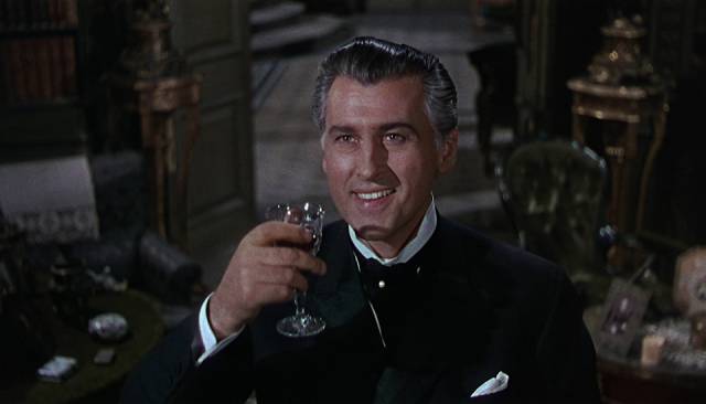 Stephen Lowry (Stewart Granger) offers a toast to the wife he has recently murdered in Arthur Lubin's Footsteps in the Fog (1955)
