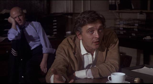 Tim Brett (David Hemmings) has a hard time convincing the police that his paranoia is justified in Richard C. Sarafian's Fragment of Fear (1970)
