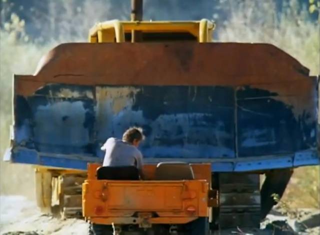 The oilmen need to use ingenuity against the 'dozer's brute force in Jerry London's Killdozer (1974)