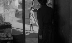 Mouchette rejects her neighbours' judgmental gaze in Robert Bresson's Mouchette (1967)