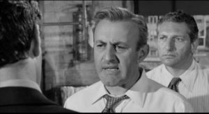 Walter Mitchell (Lee J. Cobb) refuses to hear evidence about his own complicity in violence in Robert Aldrich/Vincent Sherman's The Garment Jungle (1957)