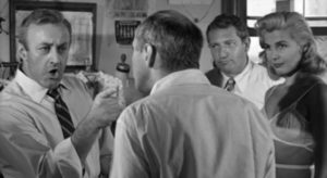 Walter Mitchell (Lee J. Cobb) argues about the union with his partner Fred Kenner (Robert Ellenstein) in Robert Aldrich/Vincent Sherman's The Garment Jungle (1957)