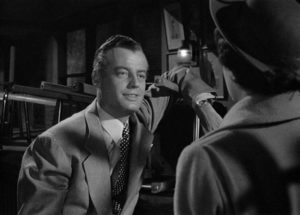 Lucia Harper (Joan Bennett) confronts Ted Darby (Sheppard Strudwick) about his affair with her underage daughter in Max Ophuls' The Reckless Moment (1949)