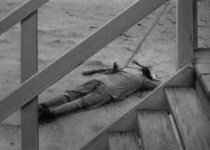 Accident or murder, Ted Darby (Sheppard Strudwick)'s body poses a problem for Lucia (Joan Bennett) in Max Ophuls' The Reckless Moment (1949)