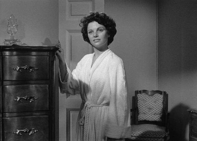 Lucia (Joan Bennett)'s daughter Bea (Geraldine Brooks) insists she's old enough to do what she wants in Max Ophuls' The Reckless Moment (1949)