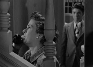 Lucia (Joan Bennett) has preserved her family, but in the end she knows she's trapped by her circumstances in Max Ophuls' The Reckless Moment (1949)