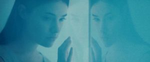 Psychic Elena (Eva Allan) is trapped in a research lab in Panos Cosmatos' Beyond the Black Rainbow (2010)
