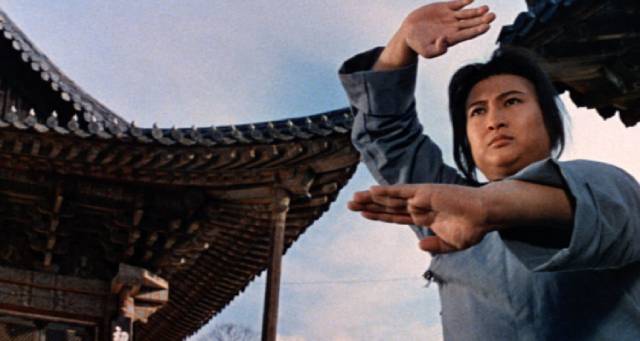 Husker (Sammo Hung) trains at the Shao-lin Temple in Sammo Hung's The Iron-Fisted Monk (1977)