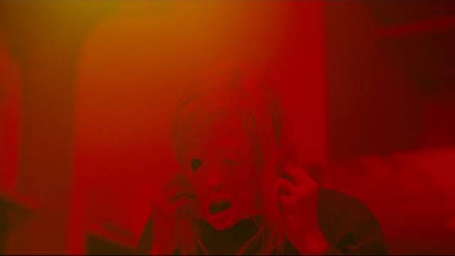 Tasya Voss (Andrea Riseborough)'s identity begins to disintegrate in Brandon Cronenberg's Possessor (2019)
