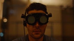 Colin Tate (Christopher Abbott) works on a virtual assembly line in Brandon Cronenberg's Possessor (2020)