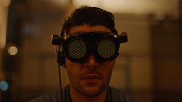 Colin Tate (Christopher Abbott) works on a virtual assembly line in Brandon Cronenberg's Possessor (2019)