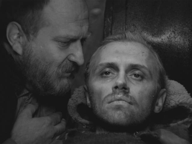 The elder (Sergey Yakoviev) bears witness to Sotnikov (Boris Plotnikov)'s suffering in Larisa Shepitko's The Ascent (1977)