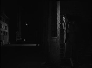 The Gamin (Adrienne Barrett) is trapped in a noirish cycle of violence in a city of perpetual night in John Parker's Dementia (1953)