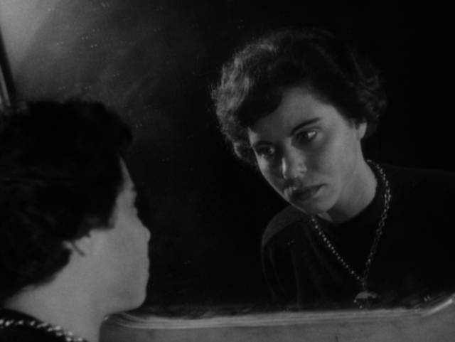 The Gamin (Adrienne Barrett) is haunted by family violence in John Parker's Dementia (1953)
