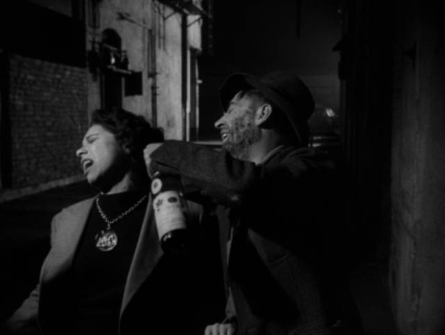 The Gamin (Adrienne Barrett) is assaulted in a back alley in John Parker's Dementia (1953)