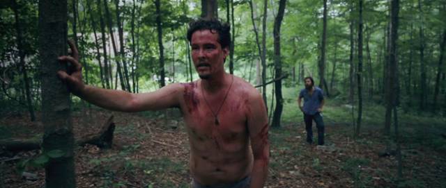Mickey (Adam Cronheim) is traumatized after a hand-to-hand fight with a zombie in Jeremy Gardner's The Battery (2012)
