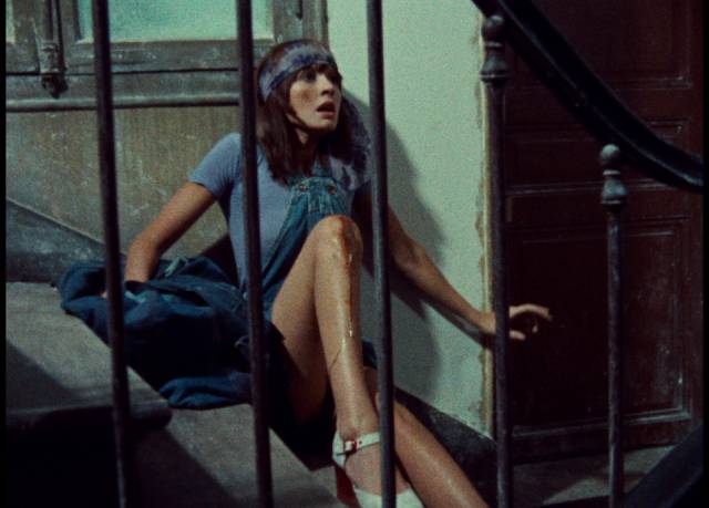 Celine (Juliet Berto) turns up injured on Julie (Dominique Labourier)'s doorstep in Jacques Rivette's Celine and Julie Go Boating (1974)
